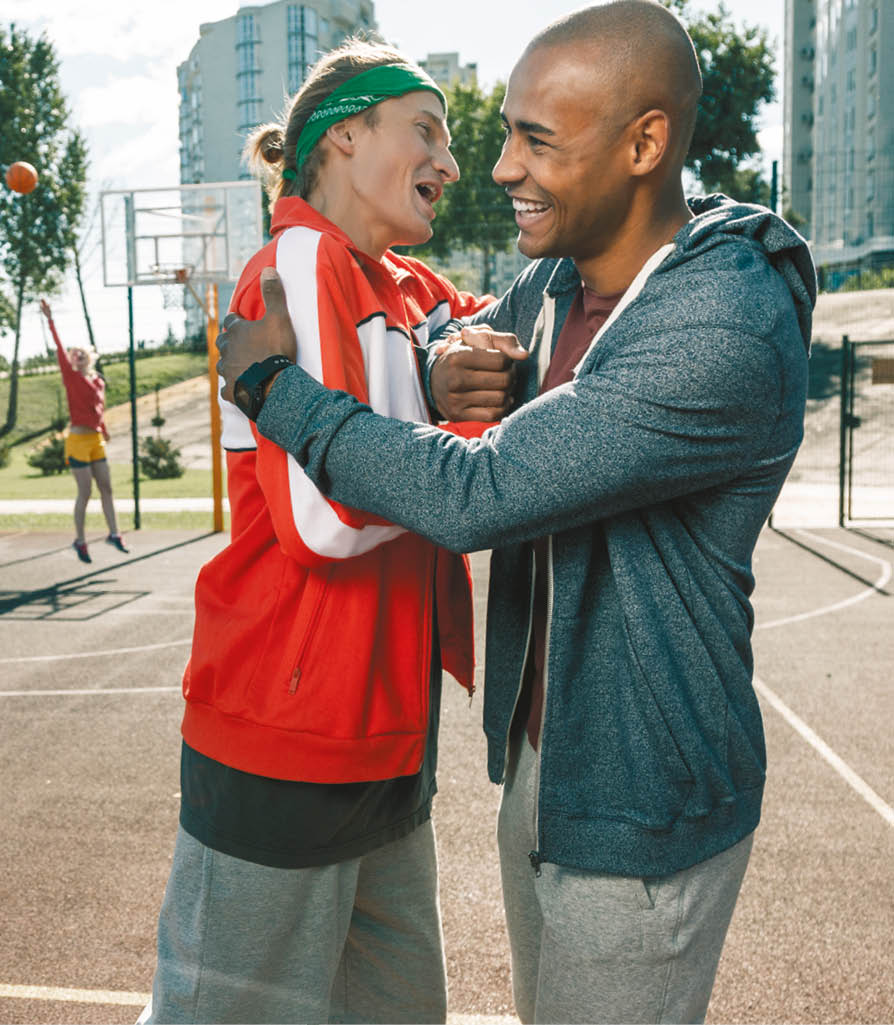 Best buddies  Positive happy men hugging each other while being happy to meet